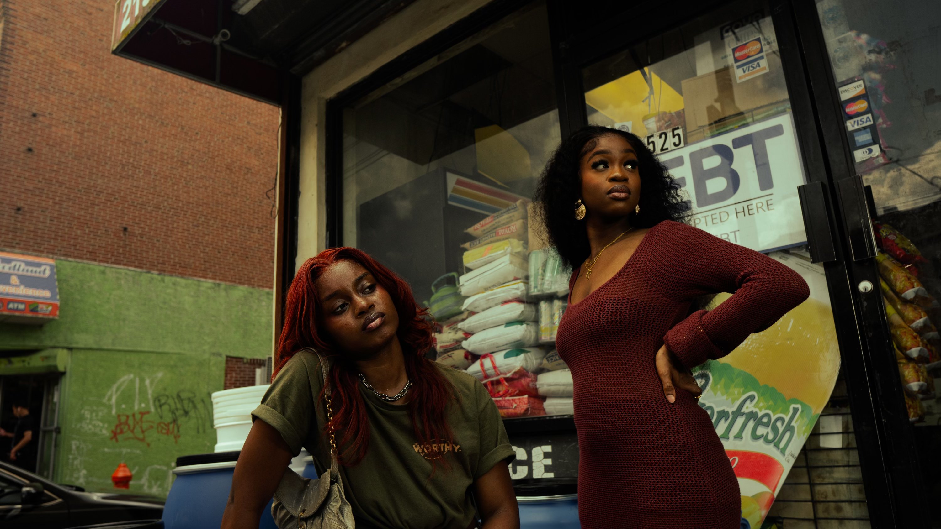 Editorial portrait near storefront