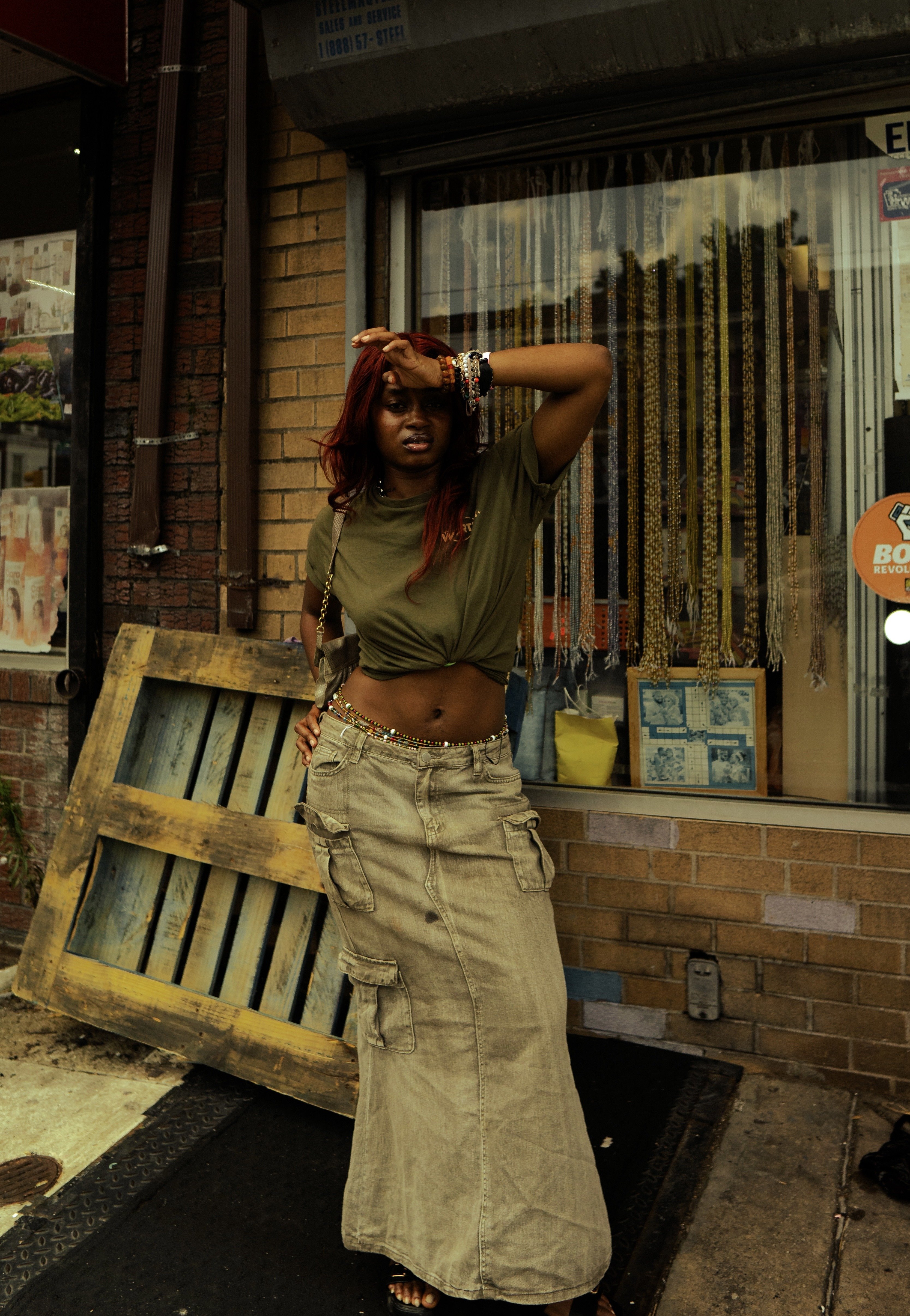 Full body portrait in front of shop